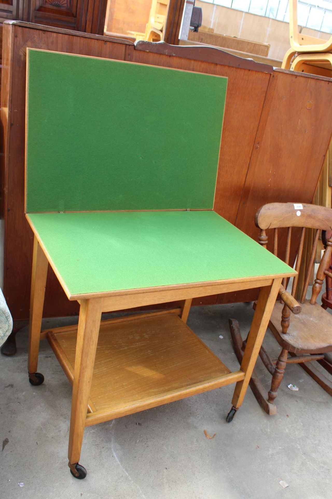 A MID 20TH CENTURY OAK 2 TIER FOLD-OVER GAMES TABLE - Image 2 of 2