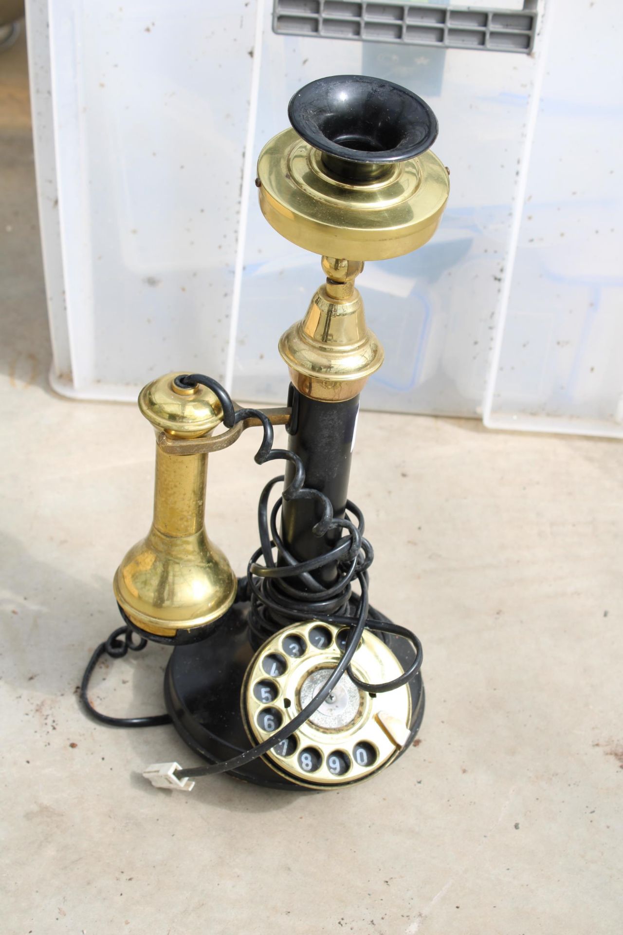 A VINTAGE STYLE CANDLE STICK TELEPHONE