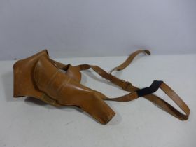 A LEATHER SHOULDER HOLSTER