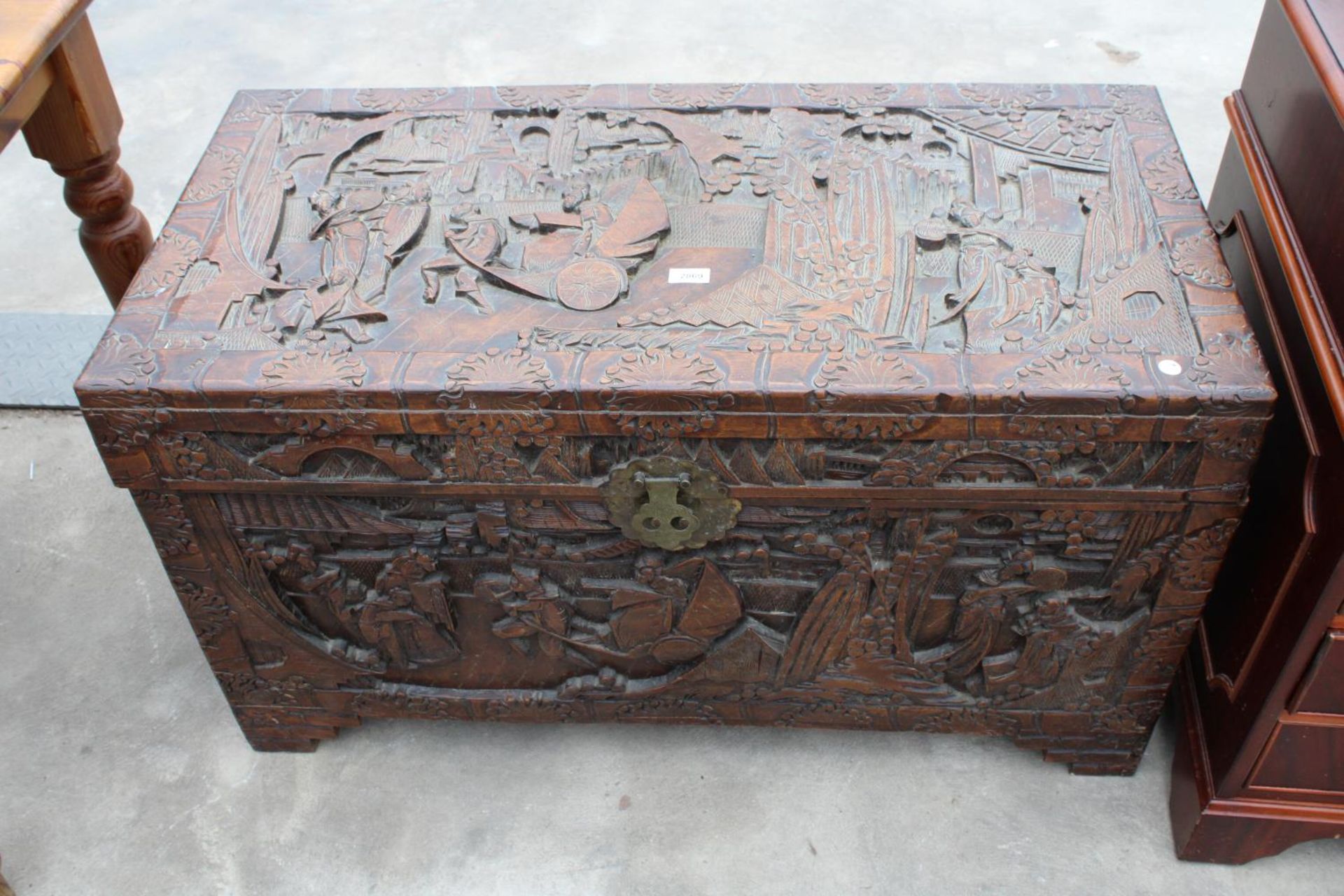 AN ORIENTAL CAMPHOR WOOD CARVED BLANKET CHEST, 41" X 20"