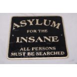 A CAST 'ASYLUM FOR THE INSANE' SIGN, 26CM X 23CM