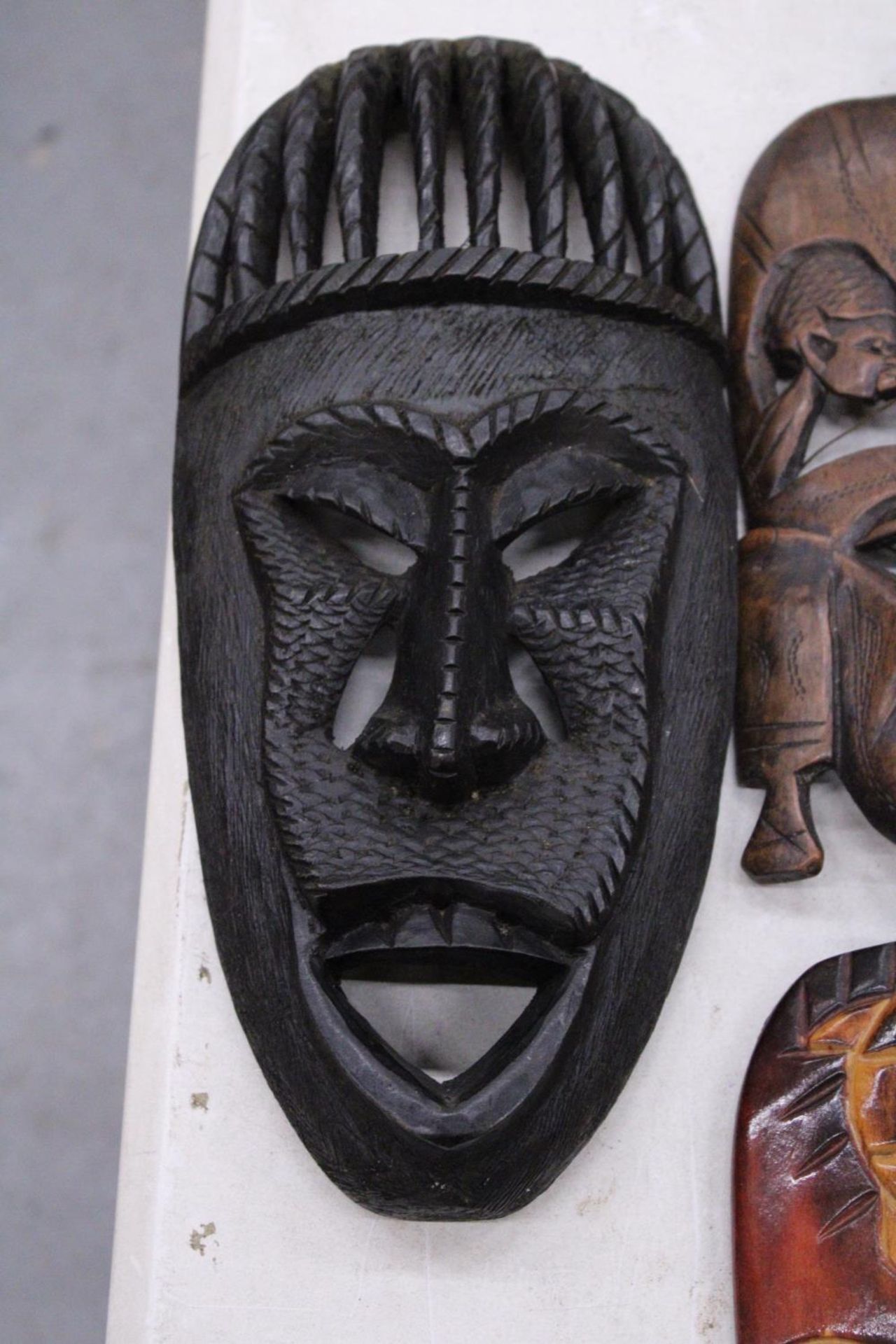 FIVE AFRICAN HAND CARVED WOODEN MASKS - PLUS TWO SPEARS - Image 5 of 5