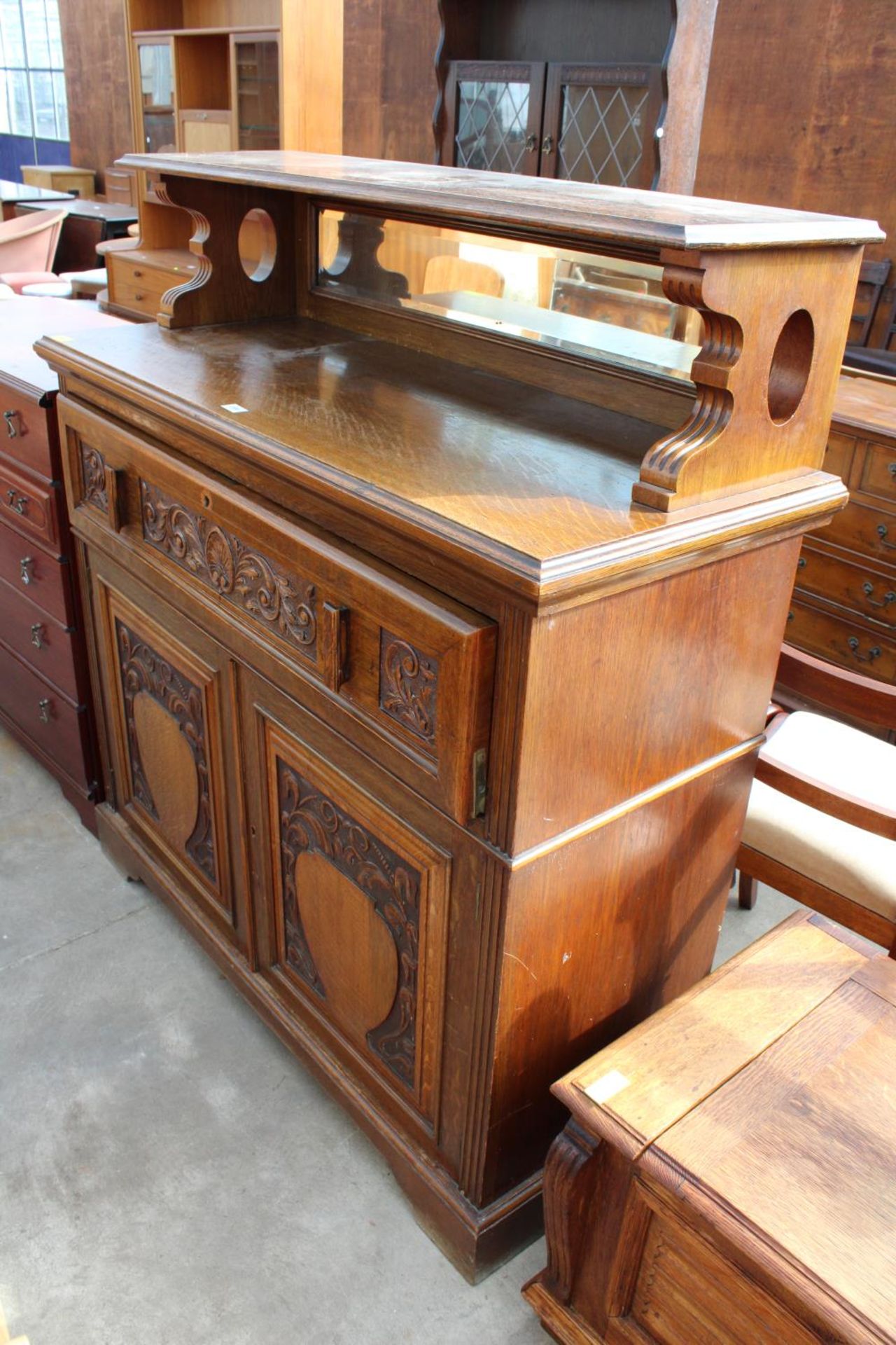 AN OAK ART NOUVEAU INFLUENCE SIDEBOARD/SECRETAIRE WITH FITTED INTERIOR, LOW MIRROR-BACK AND CARVED - Image 2 of 7