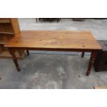 A VICTORIAN STYLE PINE KITCHEN TABLE ON TURNED LEGS, 72" X 35"