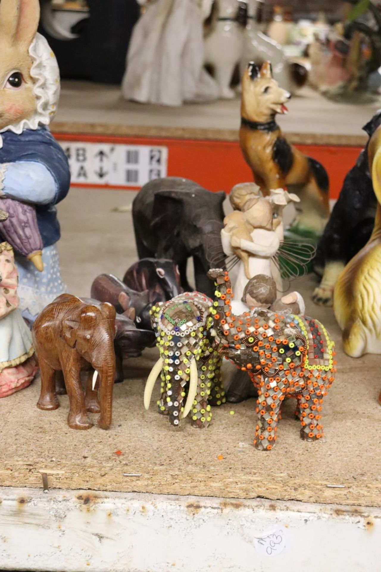 A COLLECTION OF ELEPHANTS AND THREE WILLOW TREE FIGURES