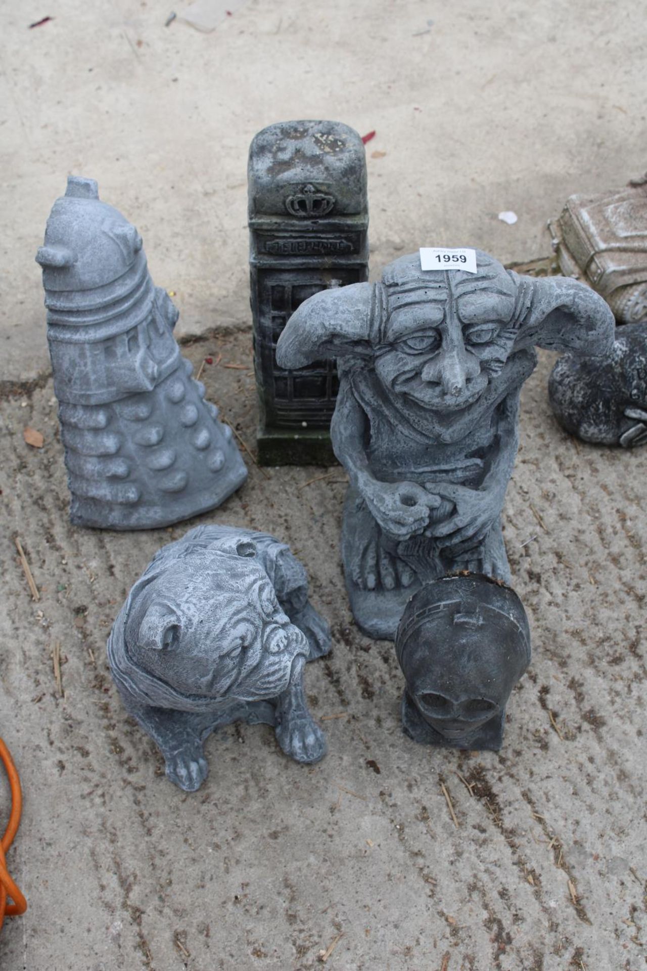 FIVE CONCRETE GARDEN FIGURES TO INCLUDE DOBBIE AND A DARLICK ETC