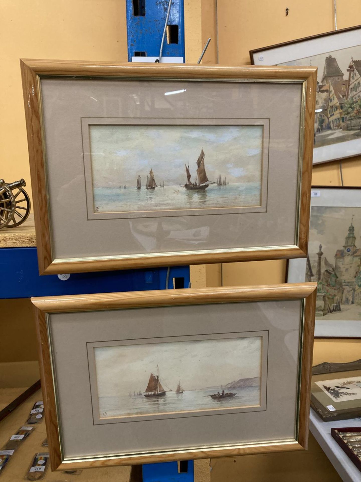 TWO FRAMED WATERCOLOURS OF BOAT SCENES SIGNED F.D