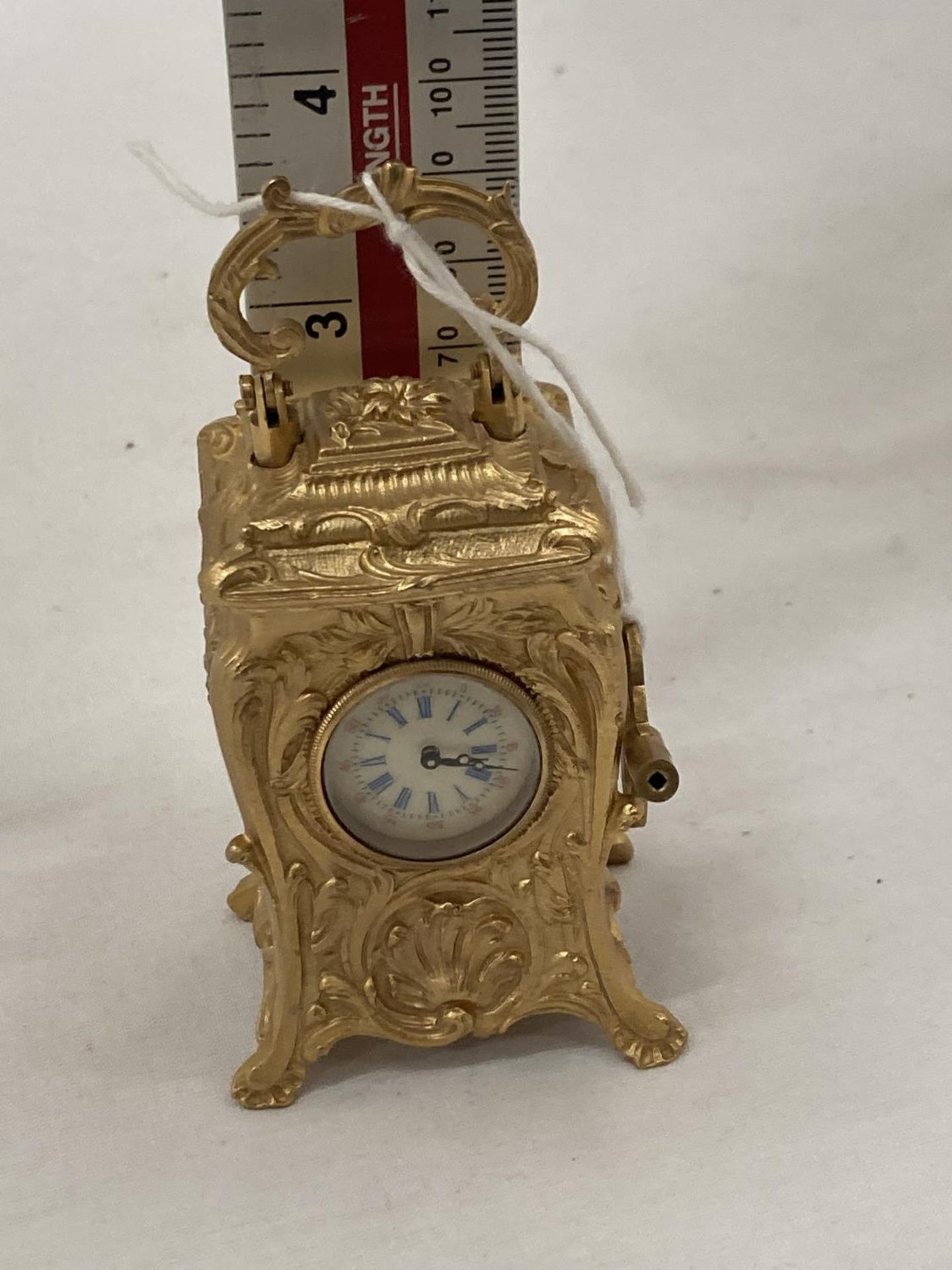 A MINIATURE GILDED FRENCH CLOCK WITH KEY HEIGHT 3.5" SEEN WORKING BUT NO WARRANTY - Image 5 of 6