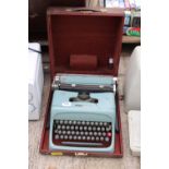 AN OLIVETTI STUDIO 44 TYPEWRITER WITH CARRY CASE