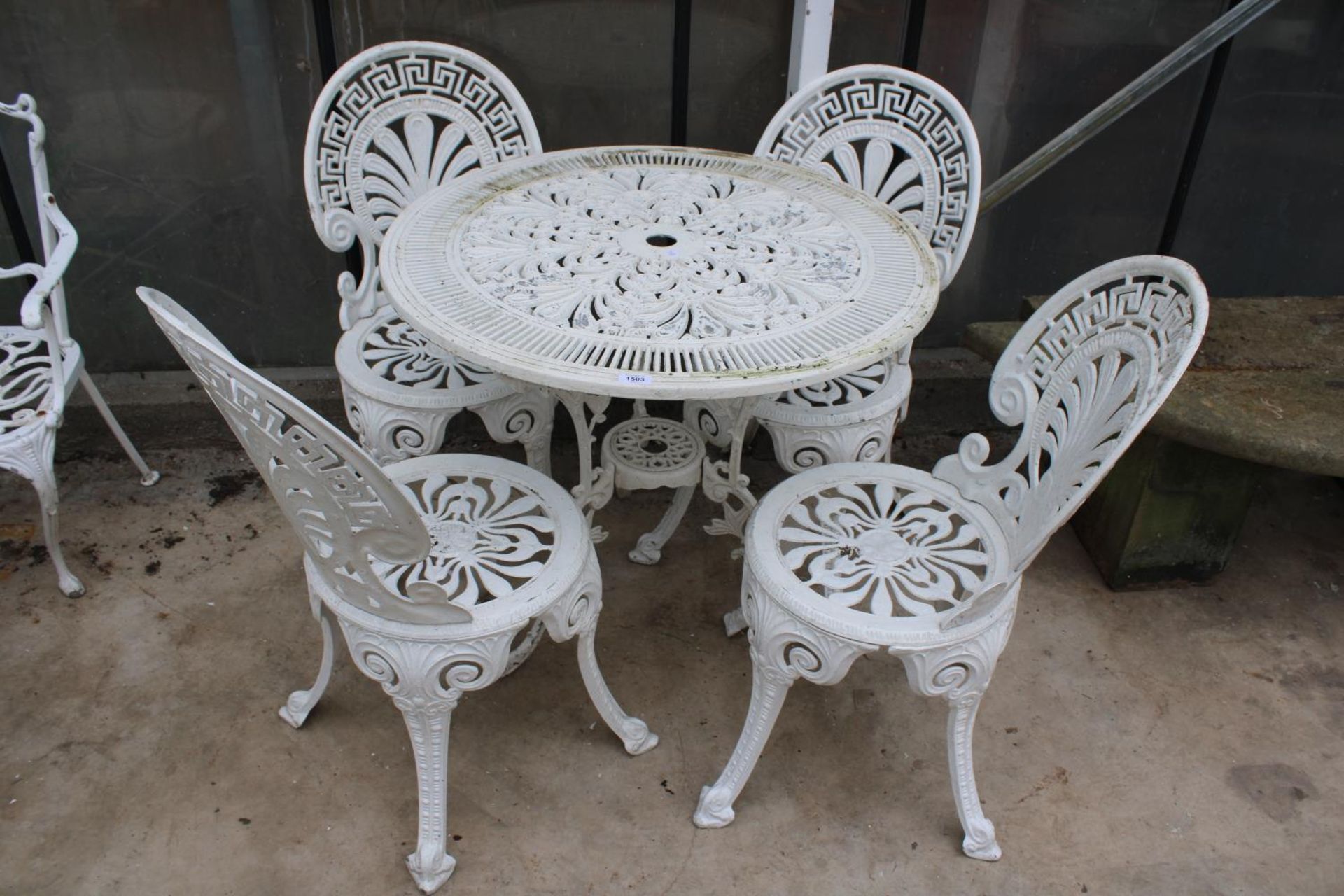A VINTAGE CAST ALLOY BISTRO SET COMPRISING OF A ROUND TABLE AND FOUR CHAIRS - Image 2 of 6