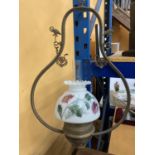 A VINTAGE HANGING OIL LAMP WITH PAINTED GLASS SHADE AND FLAMINGO DECORATION