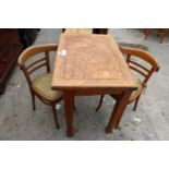 AN OAK FOLD OVER WORK TABLE AND A PAIR OF BENTWOOD CHAIRS