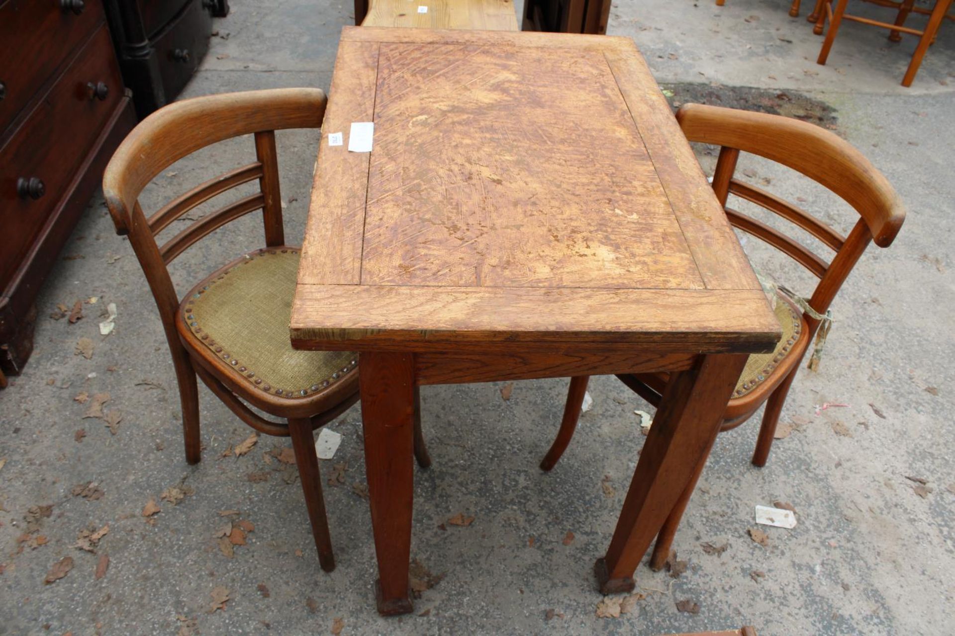 AN OAK FOLD OVER WORK TABLE AND A PAIR OF BENTWOOD CHAIRS