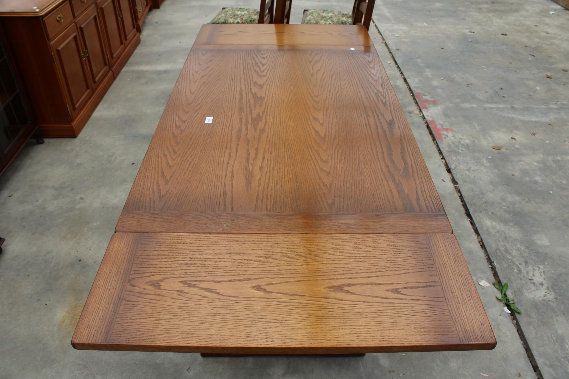 AN OAK JAYCEE REFECTORY STYLE DRAW-LEAF DINING TABLE, 48 X 32 INCHES (LEAVES 12 INCHES EACH) - Image 4 of 4