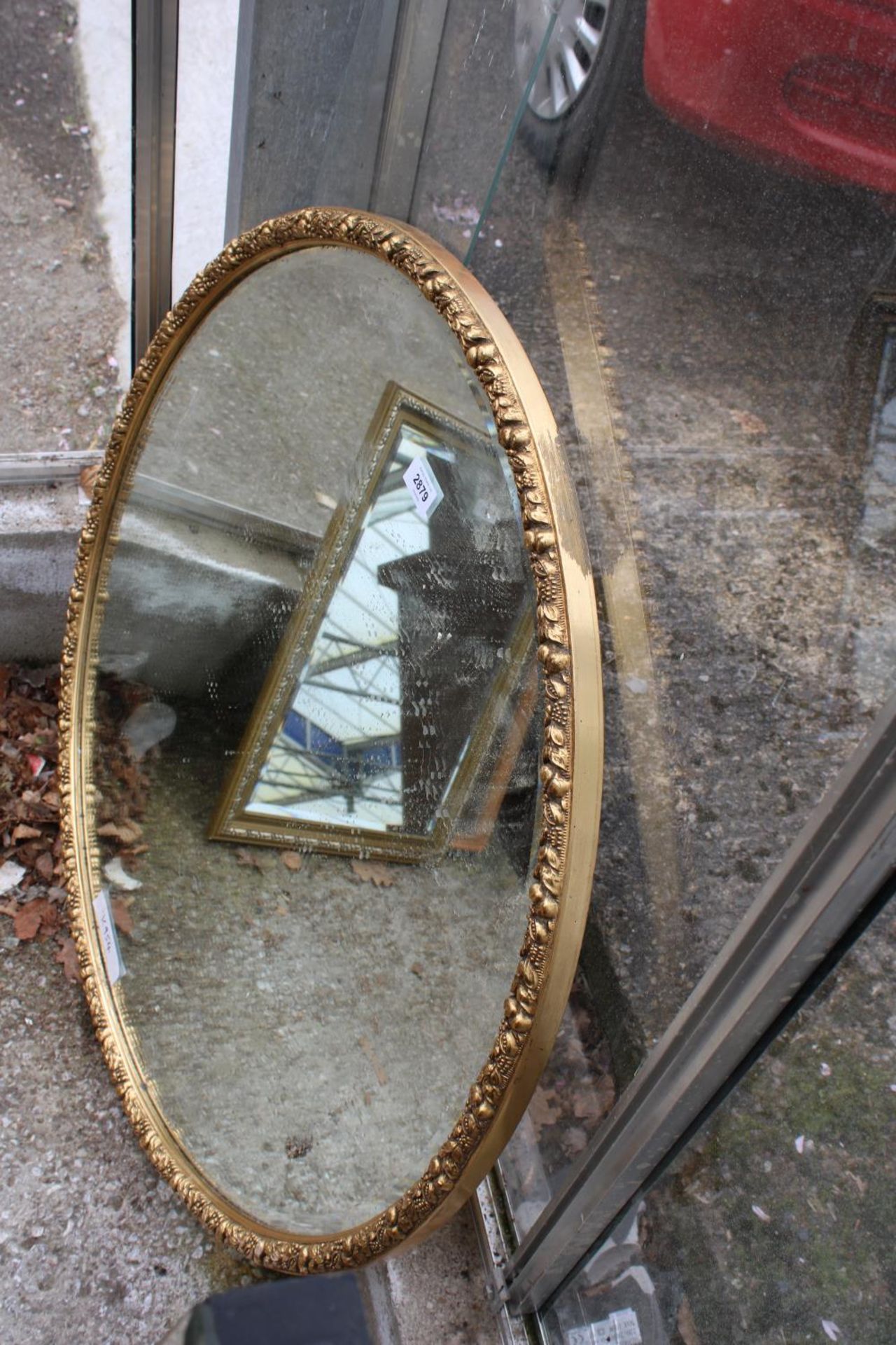 A MODERN 32" DIAMETER GILT FRAMED WALL MIRROR - Image 2 of 2