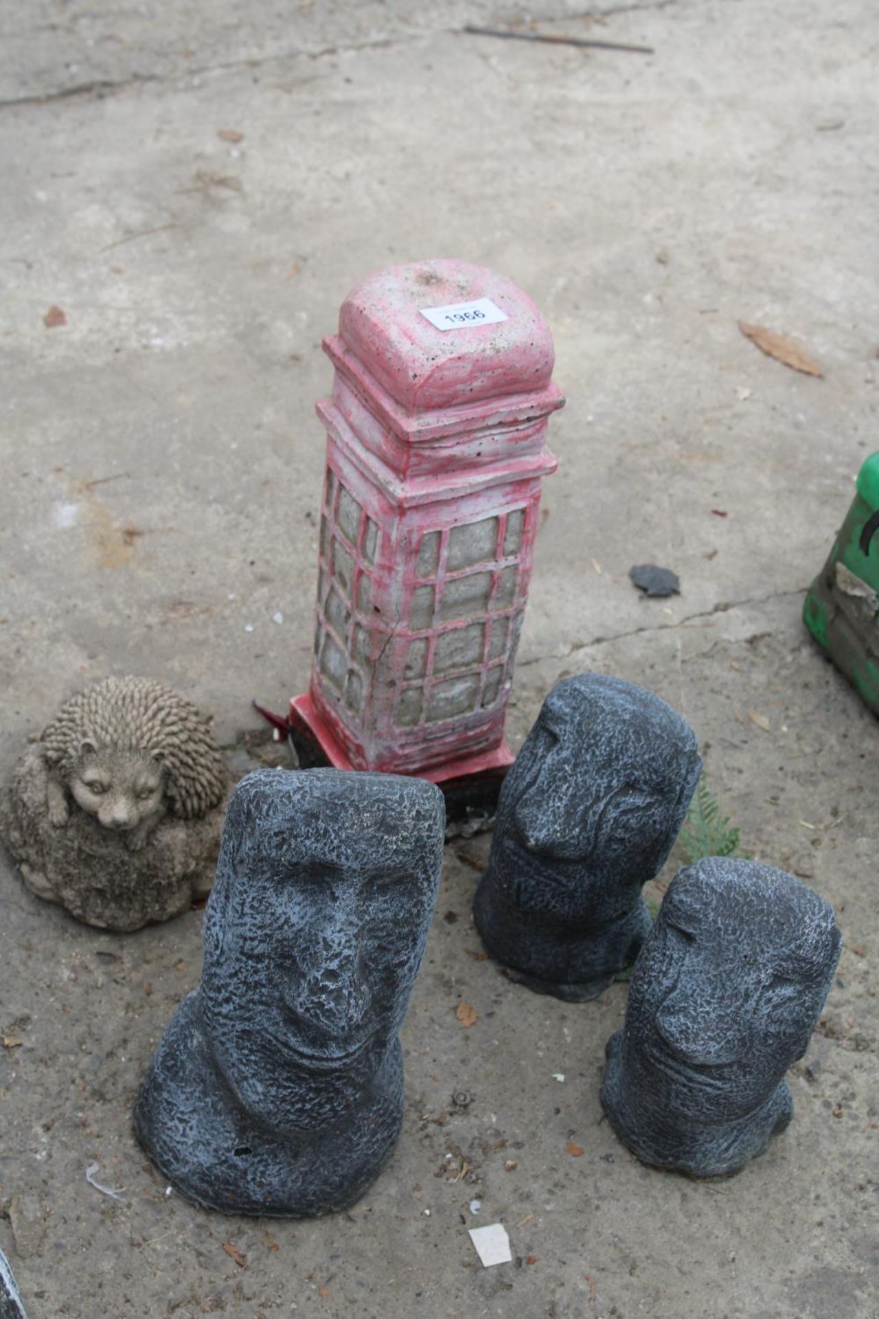 FIVE CONCRETE GARDEN FIGURES TO INCLUDE A PHONE BOX AND A HEDGEHOG ETC