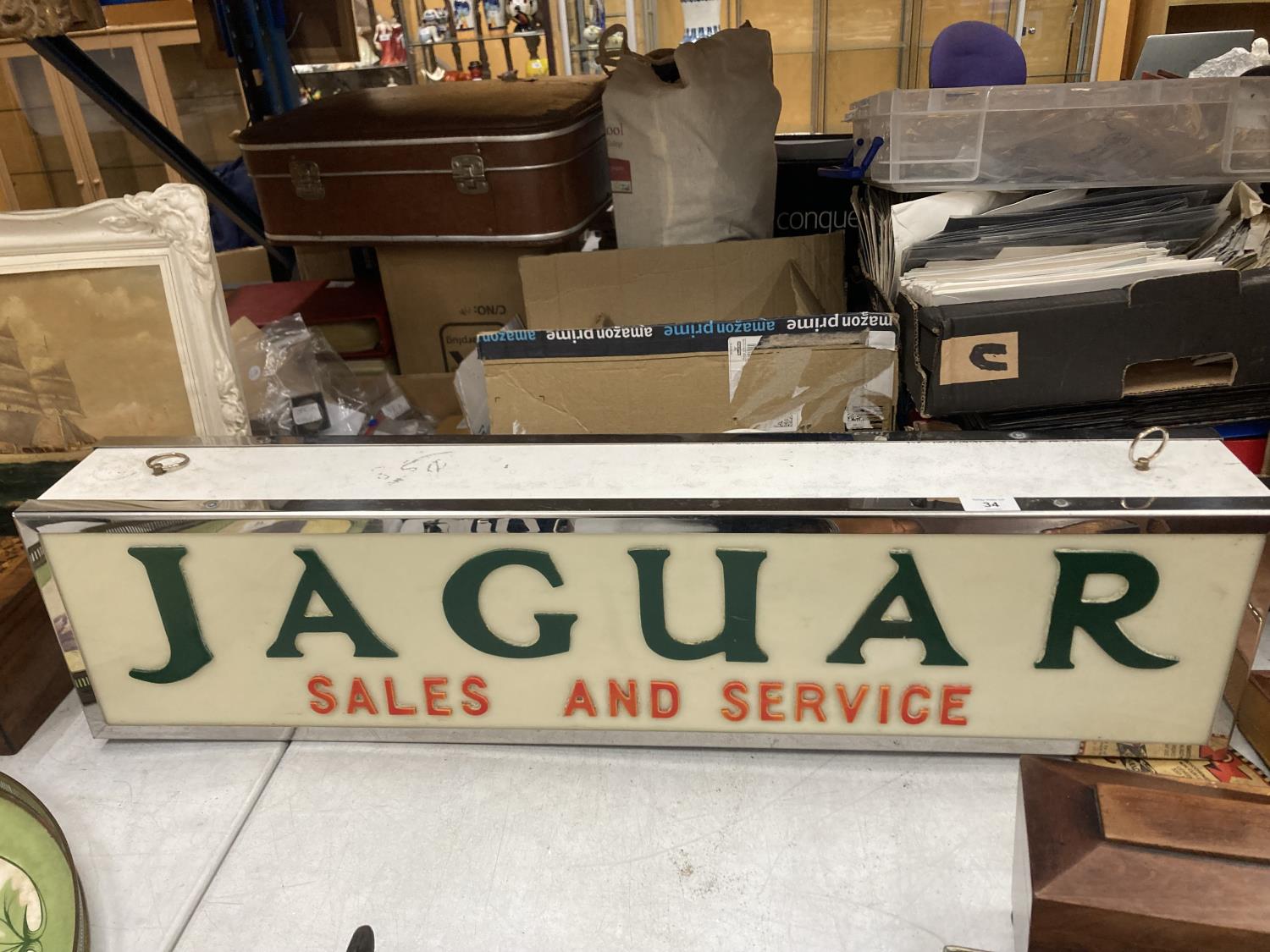 A DOUBLE SIDED JAGUAR SALES AND SERVICE ILLUMINATED LIGHT BOX SIGN BELIEVED IN WORKING ORDER BUT