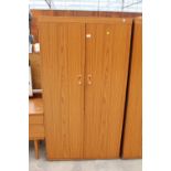 A RETRO SCHREIBER TWO DOOR WARDROBE, 35" WIDE