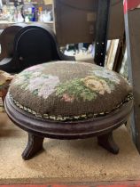A VINTAGE TAPESTRY STOOL/FOOTSTOOL WITH FLORAL PATTERN