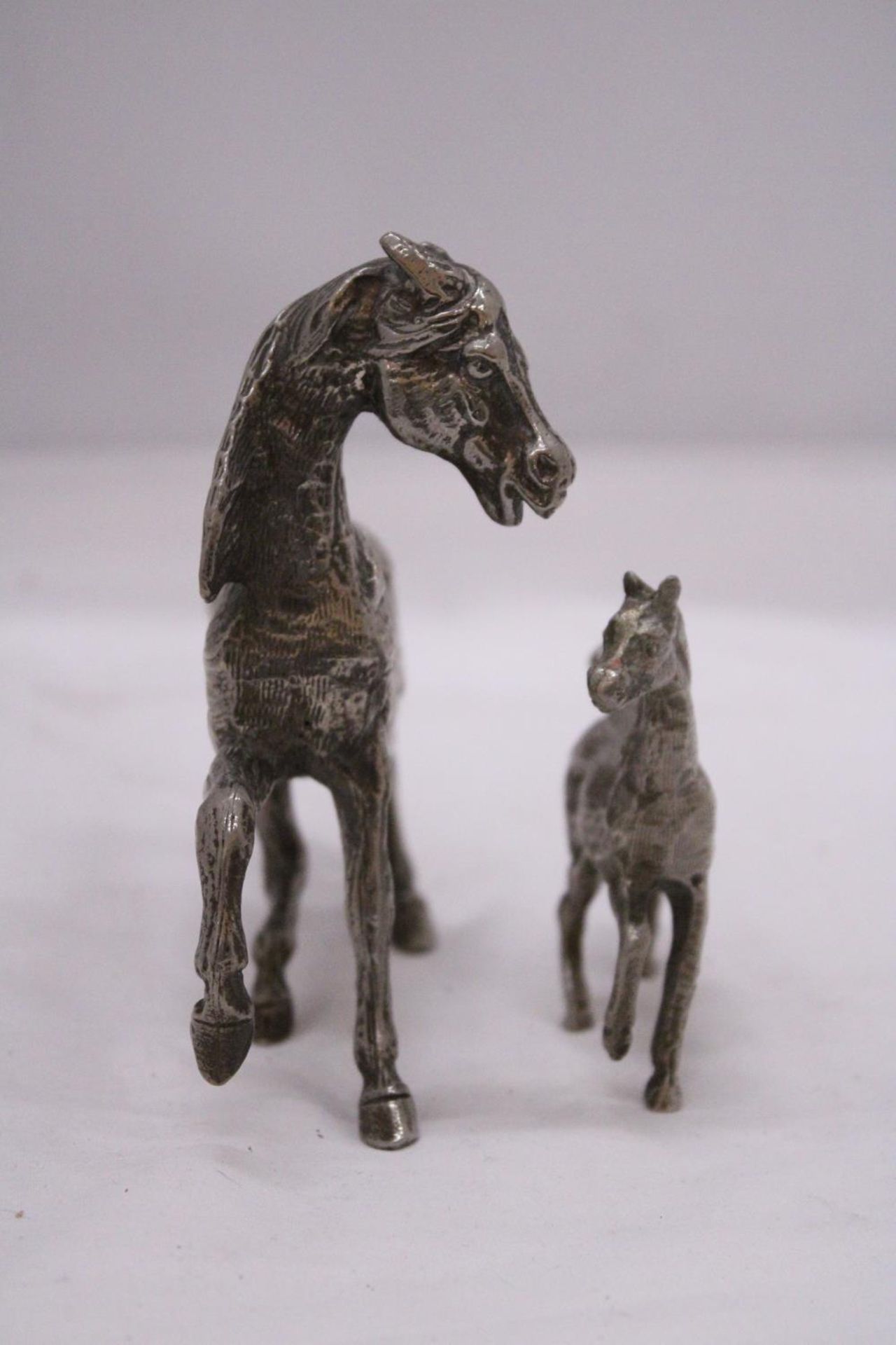 TWO WHITE METAL MODELS OF HORSES - Image 3 of 5