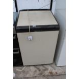 A BROWN AND CREAM HOTPOINT UNDER COUNTER FREEZER