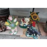 FOUR VARIOUS VINTAGE CAST IRON DOOR STOPS TO INCLUDE CATS AND FLOWERS ETC