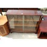 A MID 20TH CENTURY MAHOGANY BOOKCASE WITH 2 GLASS SLIDING DOORS ON CABRIOLE LEGS, 39" WIDE