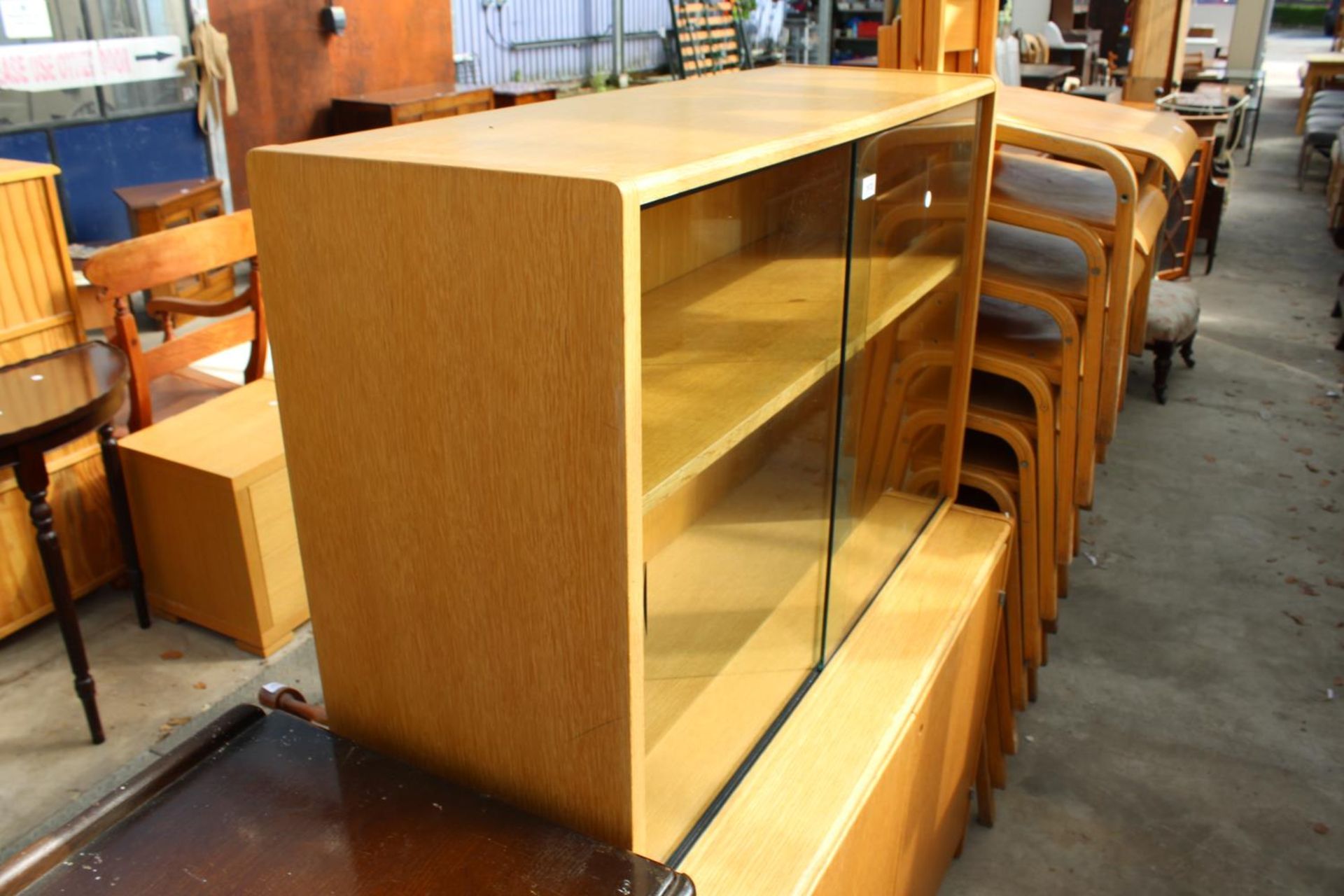 A MODERN OAK 2 DOOR GLAZED BOOKCASE ON BASE, 41.5" WIDE - Image 2 of 3