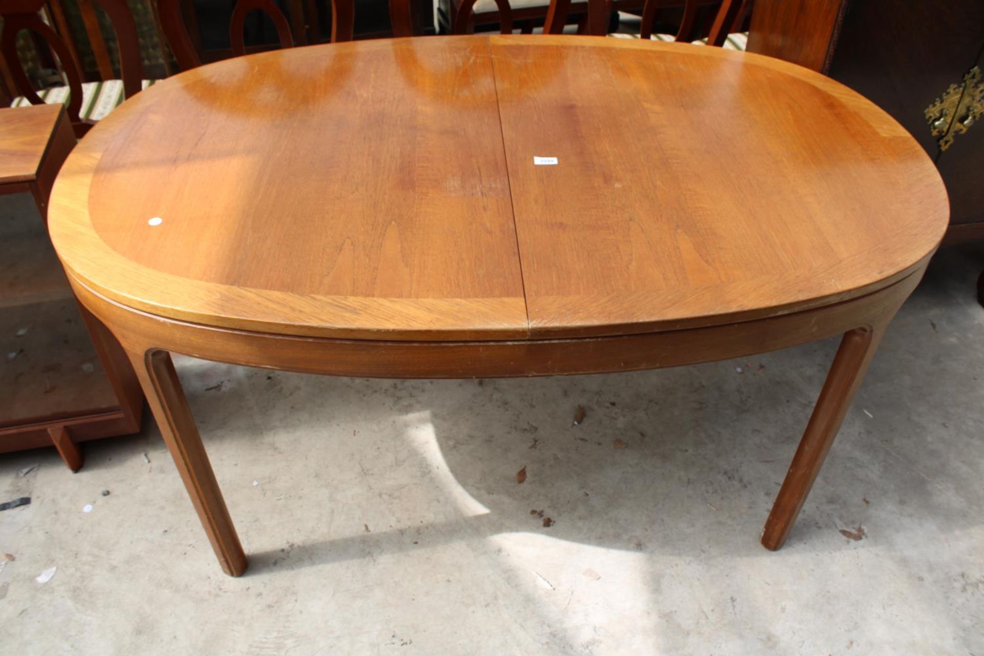 A RETRO TEAK AND CROSSBANDED EXTENDING DINING TABLE 60" X 39" (LEAF 21")