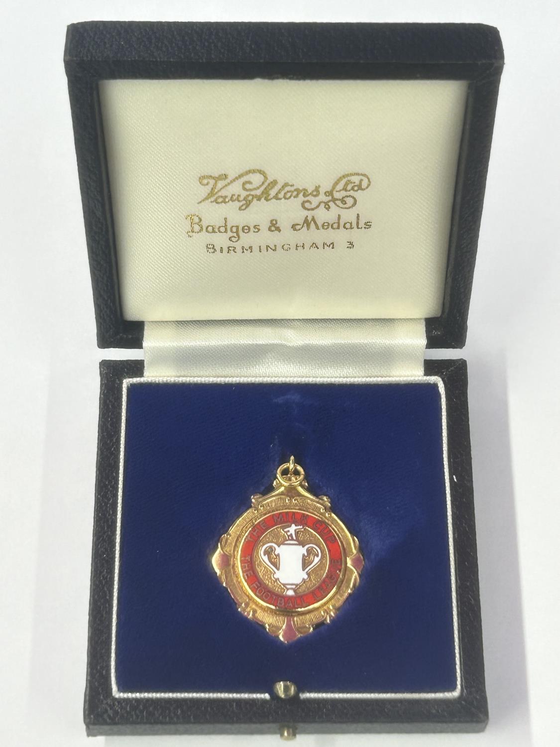 A HALLMARKED 9 CARAT GOLD & ENAMEL FOOTBALL LEAGUE MILK CUP WINNERS MEDAL 1985-1986 SEASON, BY