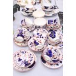 A LARGE QUANTITY OF VINTAGE GAUDY WELSH TEAWARE TO INCLUDE CAKE PLATES, SUGAR BOWLS, CUPS, SAUCERS