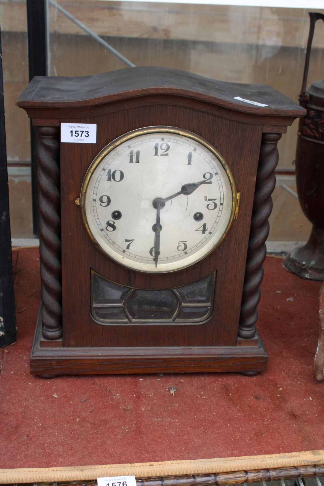 A VINTAGE OAK CASED WESTMINISTER CHIMING MANTLE CLOCK WITH BARLEY TWIST COLUMNS