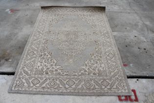 A GREY PATTERNED RUG