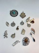 SIXTEEN VARIOUS VINTAGE PENDANTS