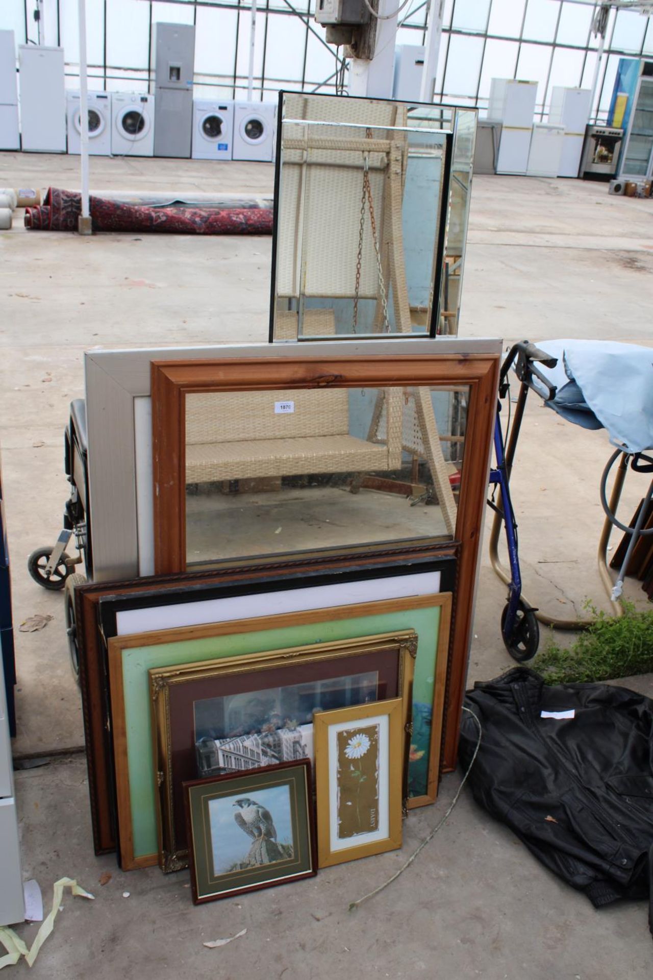 AN ASSORTMENT OF FRAMED PRINTS AND MIRRORS