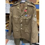 A SERGEANT MAJOR'S ROYAL LOGISTIC CORPS NO 2 TUNIC, SIZE 176/112/96, THE TUNIC WITH MEDAL BAR