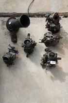 AN ASSORTMENT OF VINTAGE VEHICLE SPARES TO INCLUDE FIVE CARBURETTORS WEBBER ETC