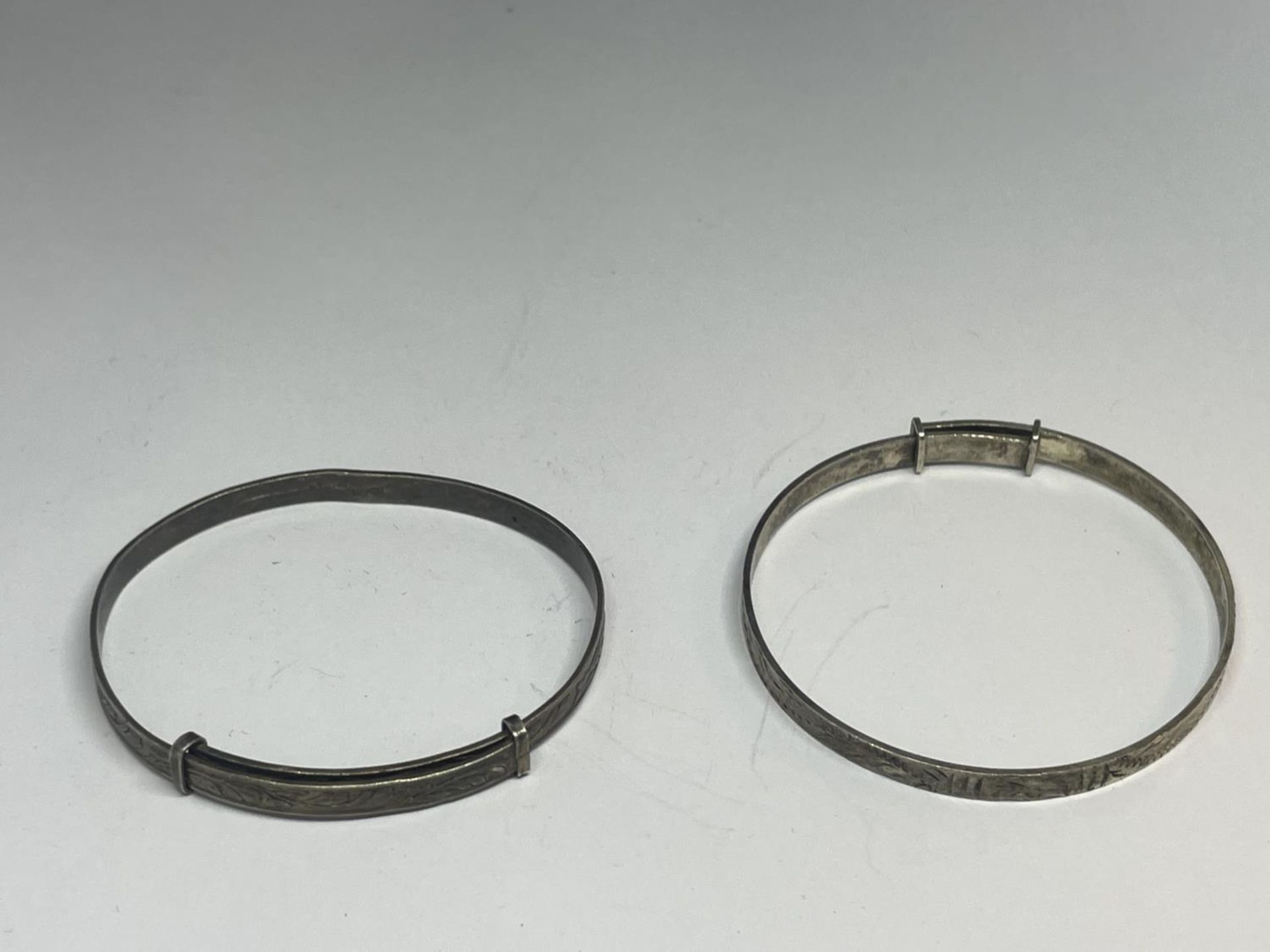 FOUR SILVER BABY BANGLES - Image 2 of 3