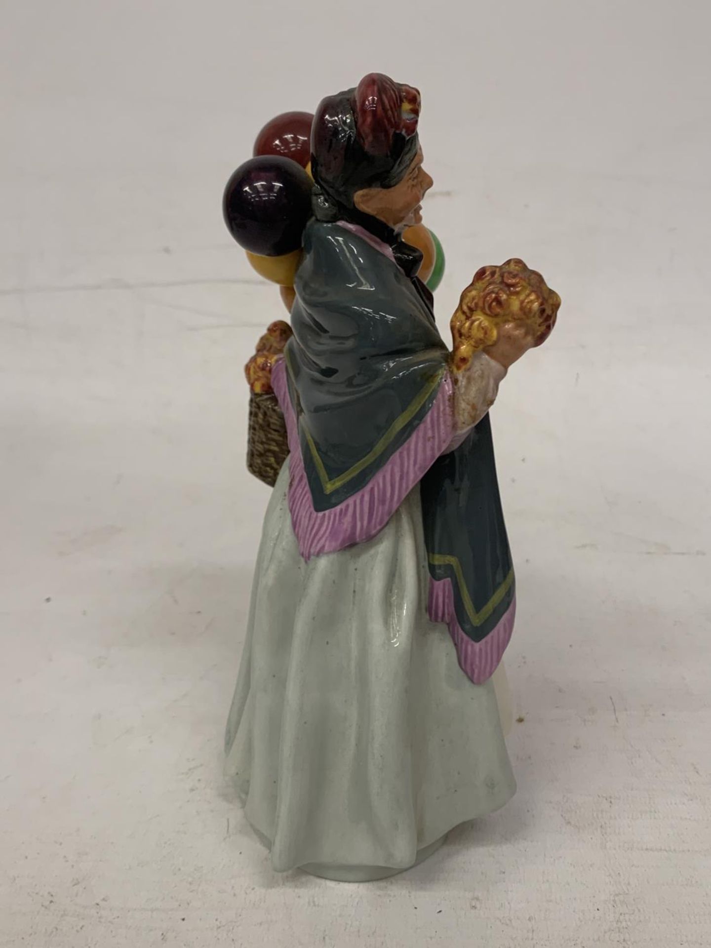 A ROYAL DOULTON FIGURE "BIDDY PENNY FARTHING" HN 1843 - Image 2 of 4