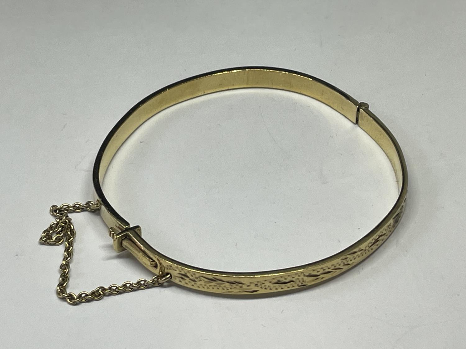 A GOLD PLATED BANGLE