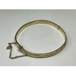 A GOLD PLATED BANGLE