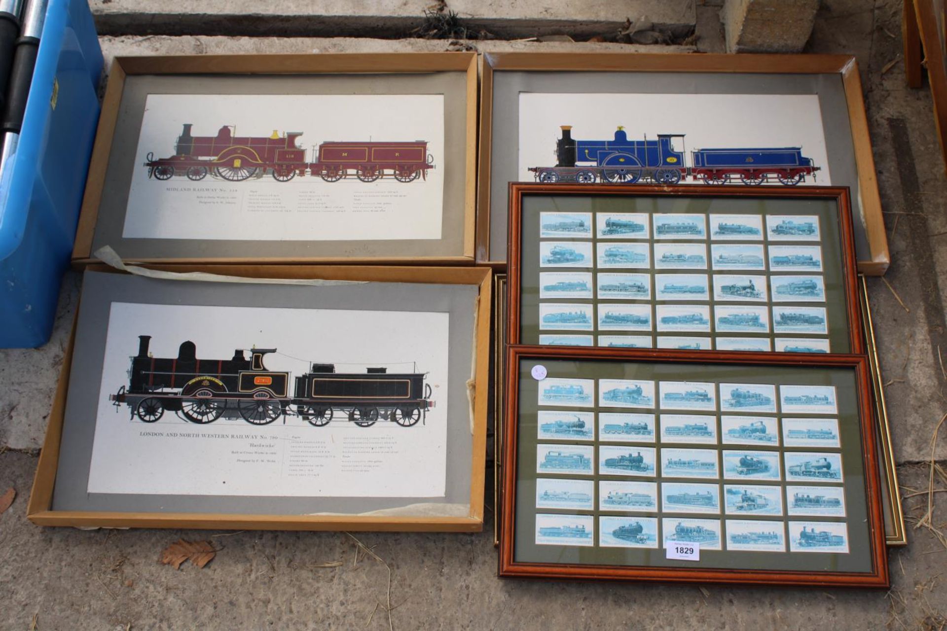 AN ASSORTMENT OF FRAMED PRINTS OF TRAINS AND FRAMED CIGARETTE CARDS OF TRAINS