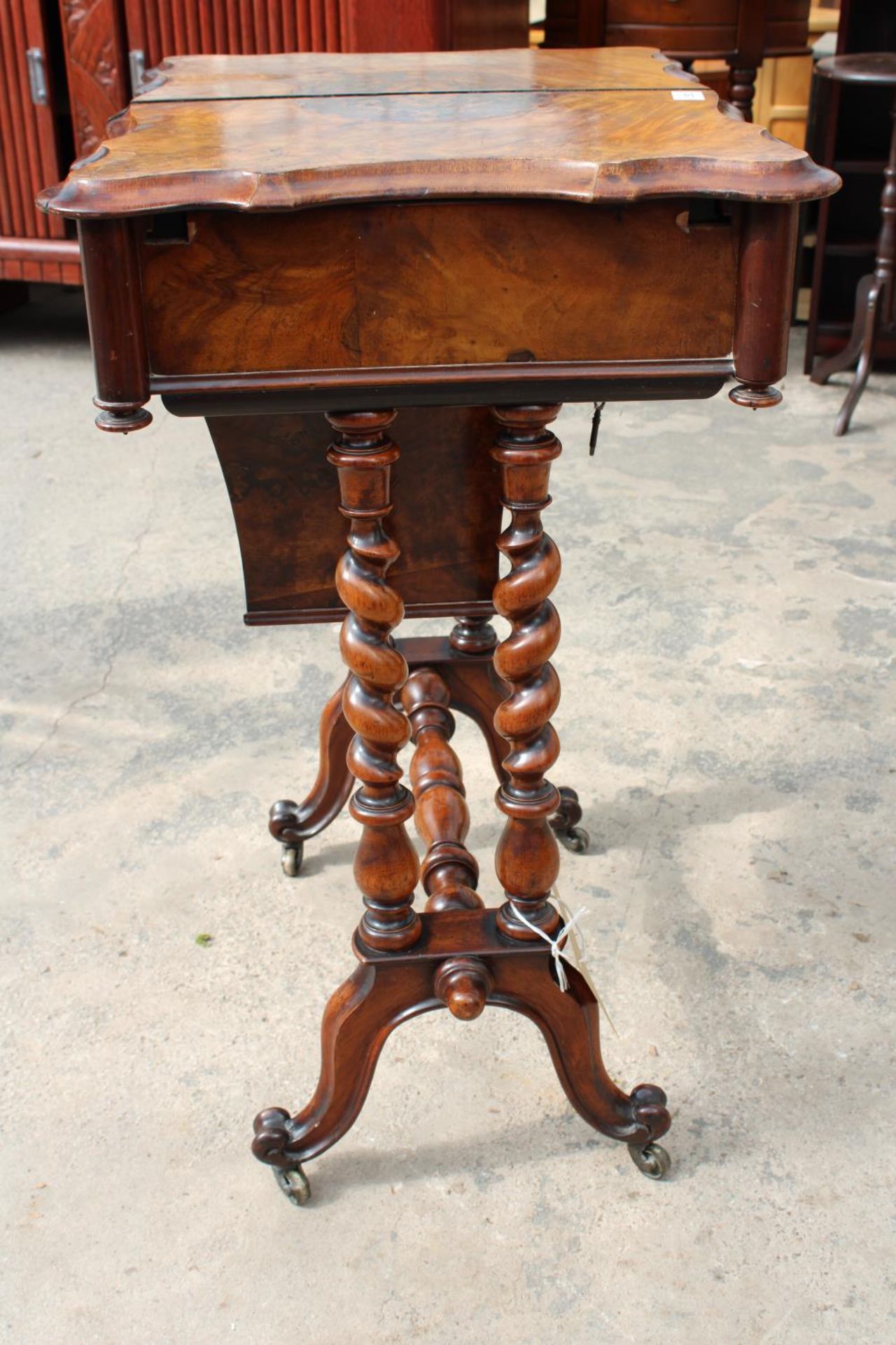 A VICTORIAN WALNUT SEWING TABLE WITH SLIDING TOP ENCLOSING 8 LIDDED COMPARTMENTS, ON BARLEY-TWIST - Image 3 of 10