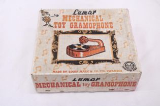 A MECHANICAL TOY GRAMPHONE