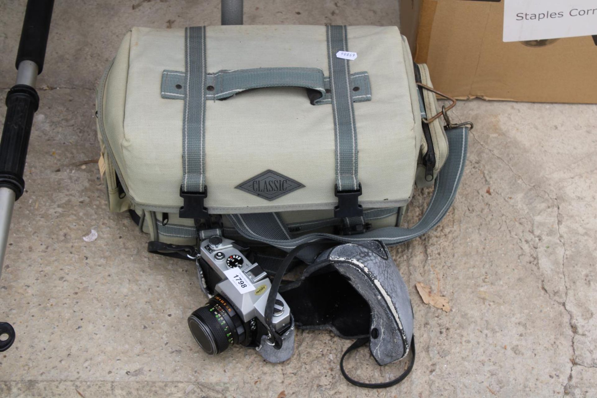 A MAMIYA CAMERA AND CAMERA BAG