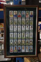 A FRAMED AND GLAZED MONTAGE OF SPORTING CIGARETTE CARDS