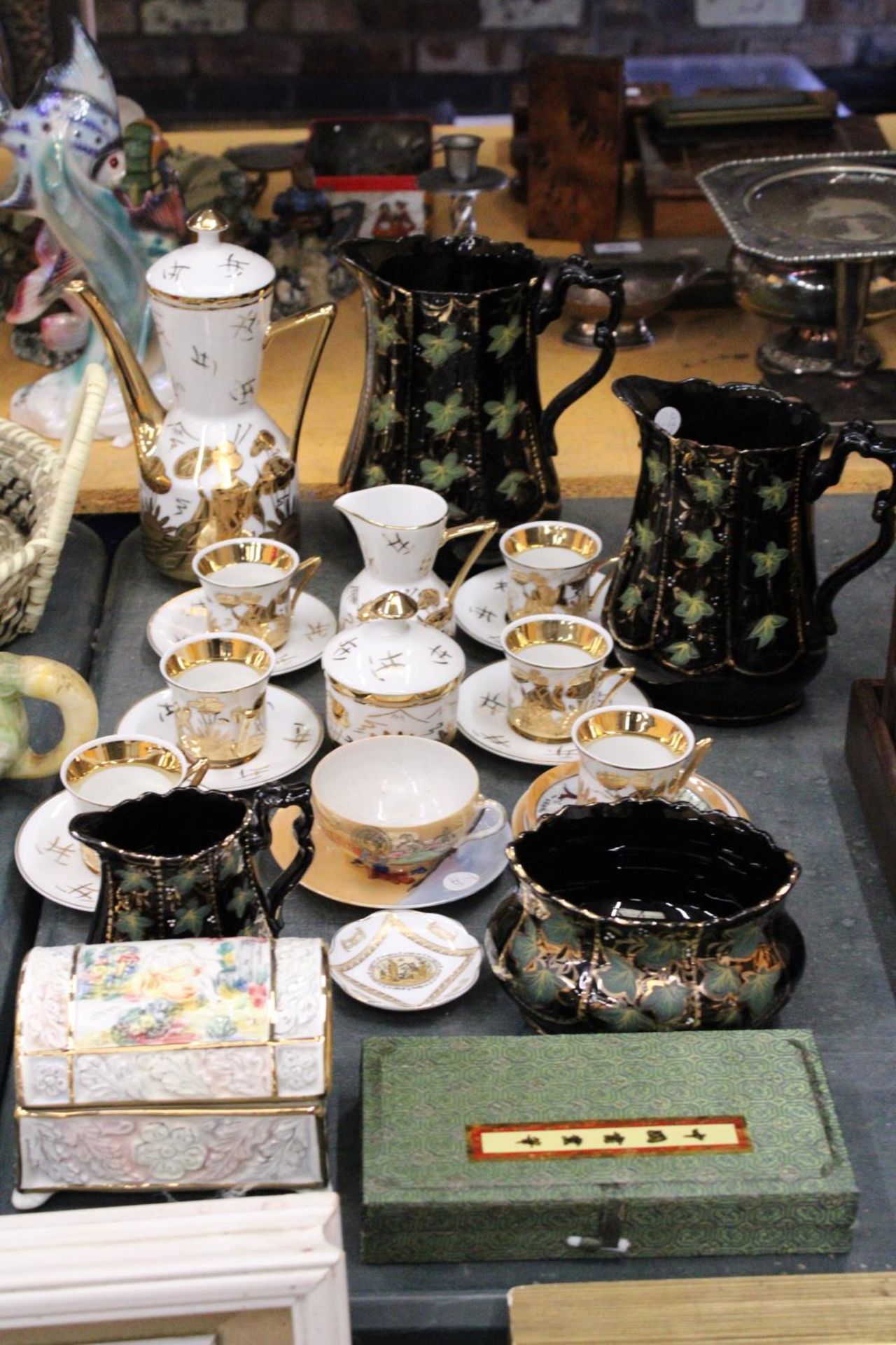 A MIXED LOT TO INCLUDE AN ORIENTAL STYLE COFFEE POT TOGETHER WITH CUPS AND SAUCERS, PLUS A AUTHENTIC