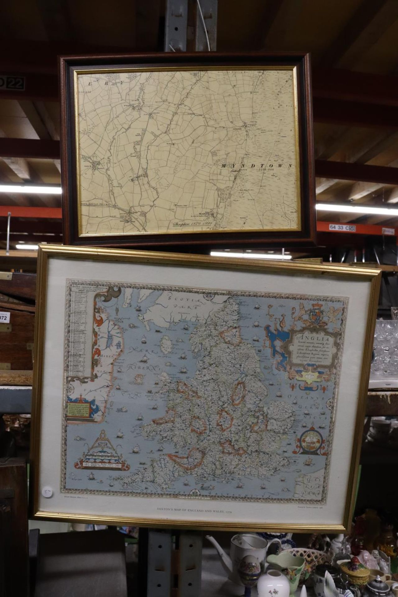 TWO FRAMED MAPS, ONE OF SHROPSHIRE 1879-1899, THE OTHER A PRINT OF SAXTON'S MAP OF ENGLAND AND