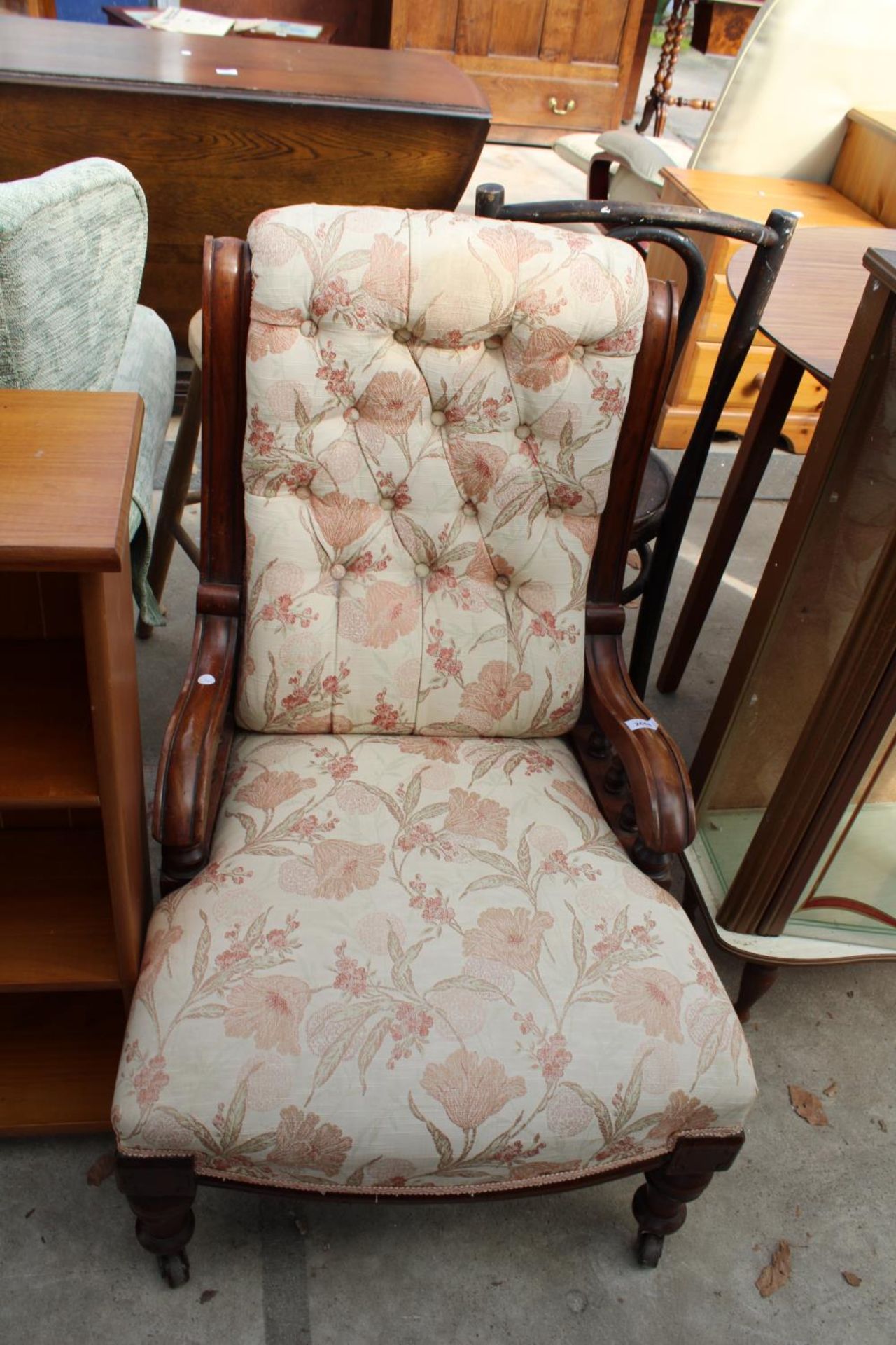 A VICTORIAN MAHOGANY NURSING CHAIR