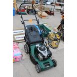 AN ATCO PETROL LAWN MOWER WITH GRASS BOX AND BRIGGS AND STRATTON ENGINE